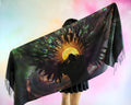 Cosmic Breakthrough festival pashmina worn from behind showing celestial sun, feather artwork, and green cosmic design