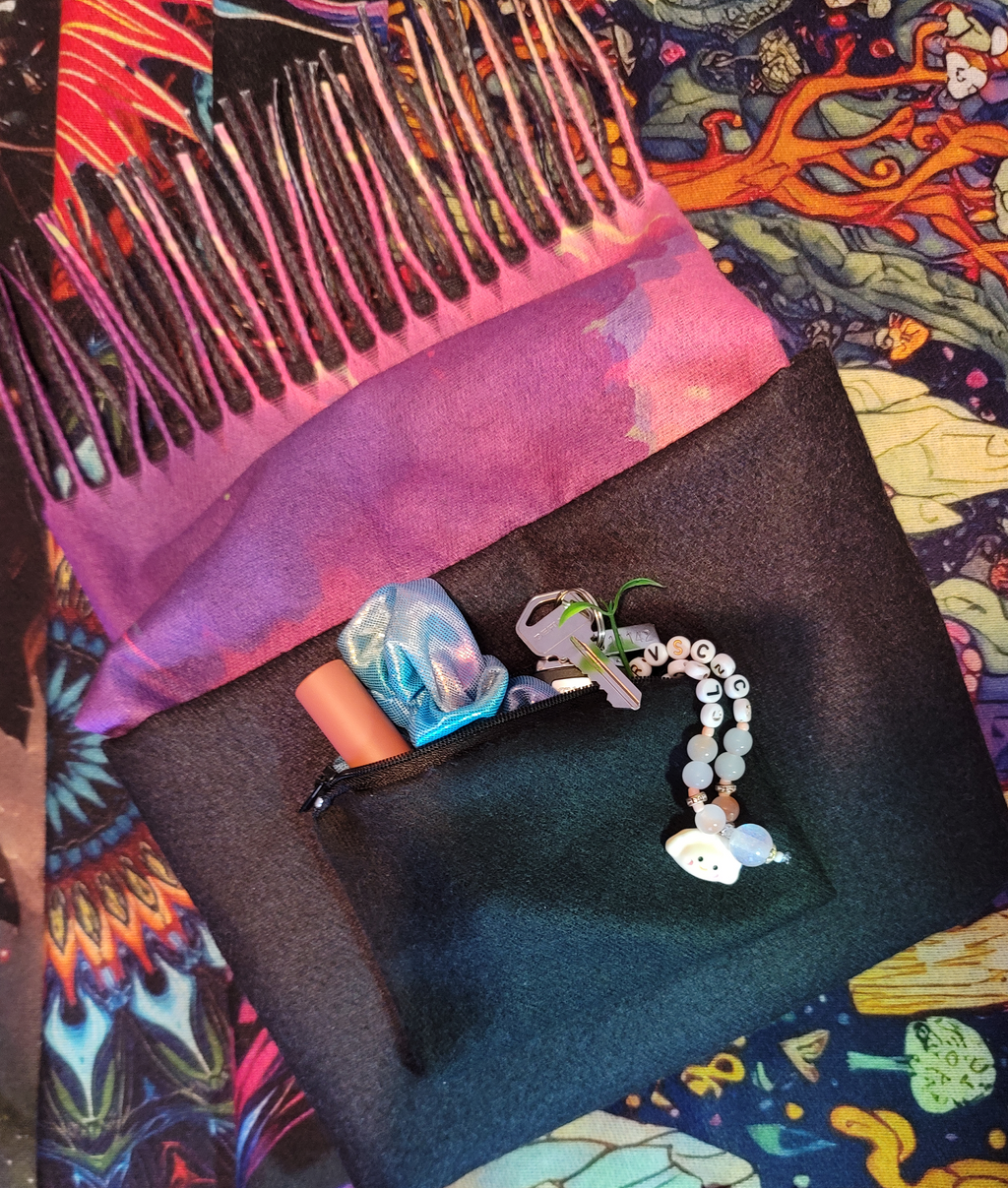 Pashmina with hidden pocket filled with essential items