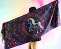 Unicorn Reborn festival pashmina worn from behind showing rainbow-haired unicorn artwork and colorful psychedelic design